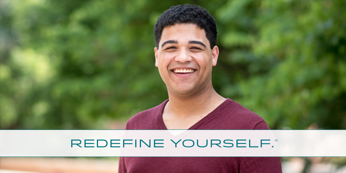 Headshot of Nick standing outside