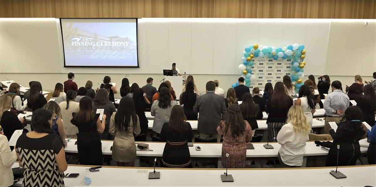 Nursing graduates recite the Nightengale Pledge.