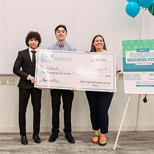Evan Smith with check for GoThrift