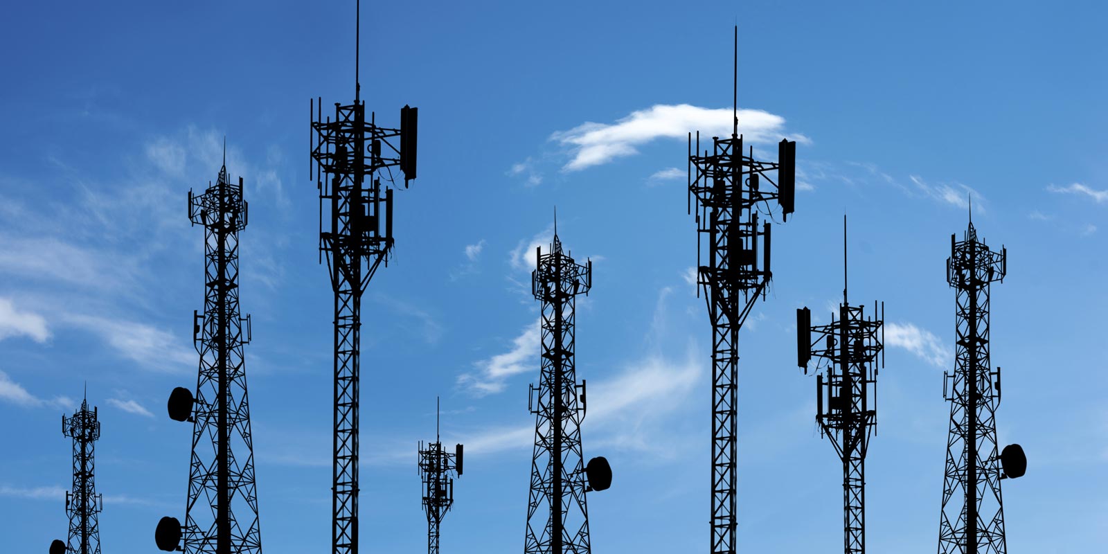 Radio Frequency Towers against a blue sky