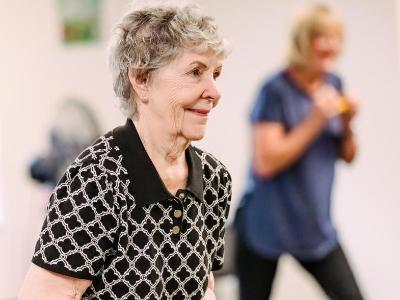 Student participating in fitness class