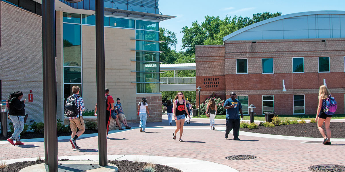 Students walk between buildings on the Arnold campus.