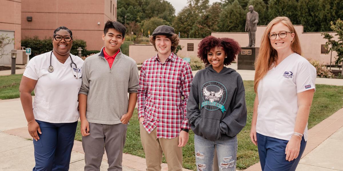 Group of AACC students smiling.