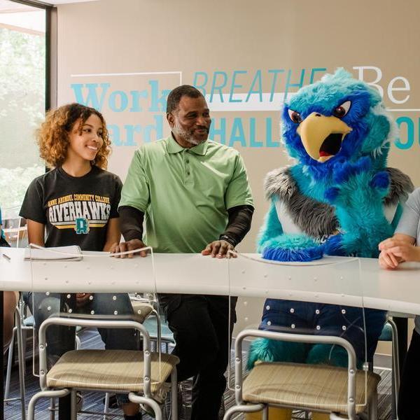 AACC students talking to Swoop.